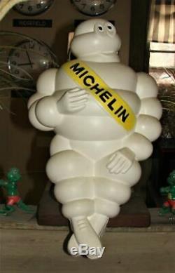 17 michelin man vintage on wood base 80s from MICHELIN 20 yr service award