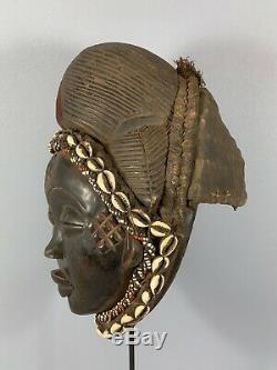 181028 Tribal used Old African female mask from the Punu with Cap Gabon