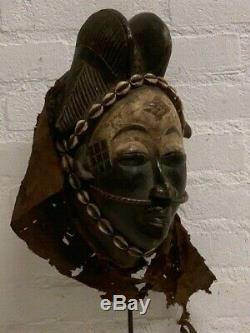 190535 Tribal used Old African female mask from the Punu with Cap Gabon