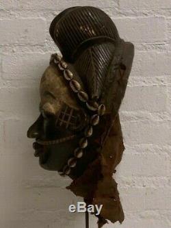 190535 Tribal used Old African female mask from the Punu with Cap Gabon