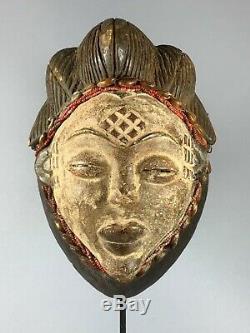 200217 Tribal used Old African female mask from the Punu with Cap Gabon