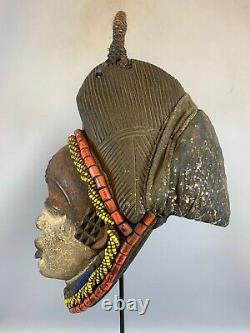 210249 Tribal used Old African female mask from the Punu with Cap Gabon