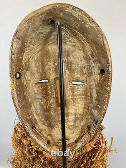 210941- Tribal used African mask from the Lega Bwami Congo