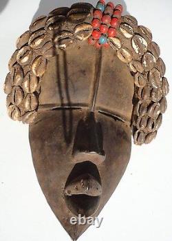 African Dan Tribe Liberia Hand Carving Wood Mask with Cowrie shells. Antique art