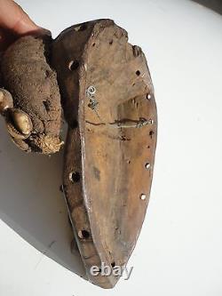 African Dan Tribe Liberia Hand Carving Wood Mask with Cowrie shells. Antique art