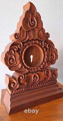 Antique carved wood table clock Made from thick, old teak wood
