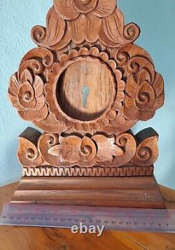 Antique carved wood table clock Made from thick, old teak wood