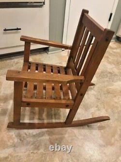 Antique child rocking chair from 1925