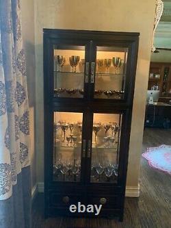Antique curio cabinet with gold stemware all from the early 1970's