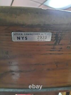 Antique wooden wheelchair from Attica prison