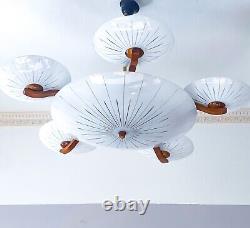 Art Deco chandelier from 1920s. Beautiful hand cut lampshades. Walnut wood