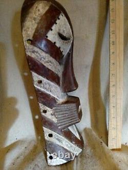 Bold Mask from the Congo Striking Colorants Authentic Carved African Wood Art