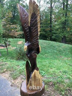 Eagle Chainsaw Carved from Walnut 48 Inches Tall