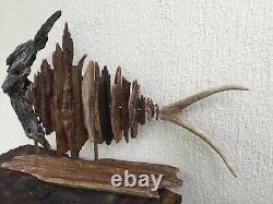 Fish art sculpture from driftwood and deer antler shed