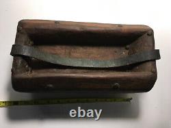 Folk art Americana wooden carrying container, made from log with leather handle