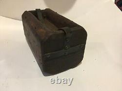 Folk art Americana wooden carrying container, made from log with leather handle