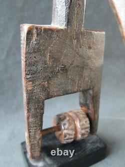 Genuine wooden heddle pulley from the Senufo, Ivory Coast