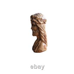 Hand-carved figurine of Christ from olive wood
