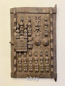 Hand carved original vintage Dogon wood door from Mali, West Africa 15 X 25