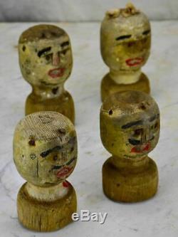 HuFour antique carved wooden heads from a French game