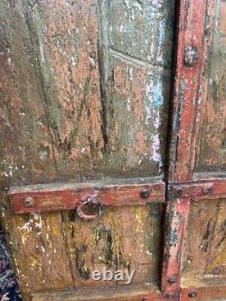 Large rustic wooden primitive, textured, colorful shutter from India