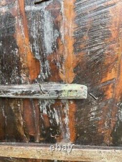 Large rustic wooden primitive, textured, colorful shutter from India