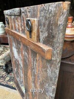 Large rustic wooden primitive, textured, colorful shutter from India