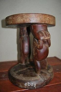 New Guinea Massim Trobriand Is table human figures carved from one piece of wood