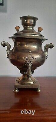 Old Tula wood-burning samovar on coins Vase from the factory of Mikhail Polyakov