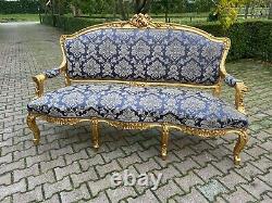 Old sofa with 4 chairs in blue damask from around 1900. Worldwide shipping