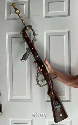 Sculpture Antique Gun made from wood, metal and brass