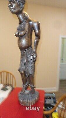 Sculpture from Manne Emsley Dipico, first Premie to HAZEL O'LEARY secretary of