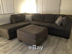 Sectional Grey Side With Ottoman. Long Side To The Right. From Ashleys Furnitur
