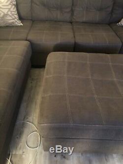 Sectional Grey Side With Ottoman. Long Side To The Right. From Ashleys Furnitur