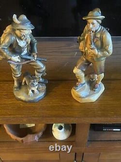 Two Vintage 7 1/2 German hunter and dog Hand carved From Germany