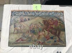 Two antique Italian painted and carved wood panels from a Sicilian donkey cart