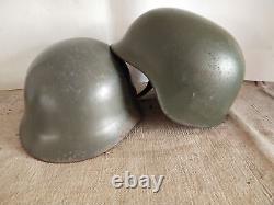 Two retired second-hand military helmets from Chinese antiques