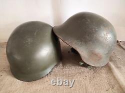 Two retired second-hand military helmets from Chinese antiques