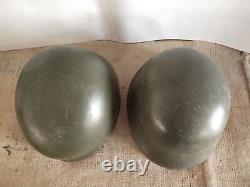 Two retired second-hand military helmets from Chinese antiques