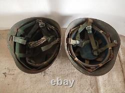 Two retired second-hand military helmets from Chinese antiques