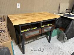 Vintage Workbench Kitchen Island from a chicken incubator with butcher block top