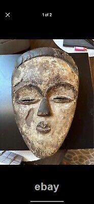Vuvi or Kwele African Ceremonial Dancing Mask. Original from Gabon