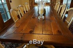 Wood Farmhouse Table from Eddy West and 8 rush seat Chairs- 2 Arm, 6 Side