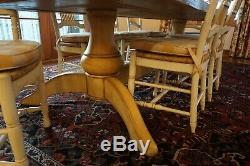 Wood Farmhouse Table from Eddy West and 8 rush seat Chairs- 2 Arm, 6 Side